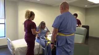 Physical Therapy Transfer Training  How To Transfer From Wheelchair To Bed [upl. by Selinski]